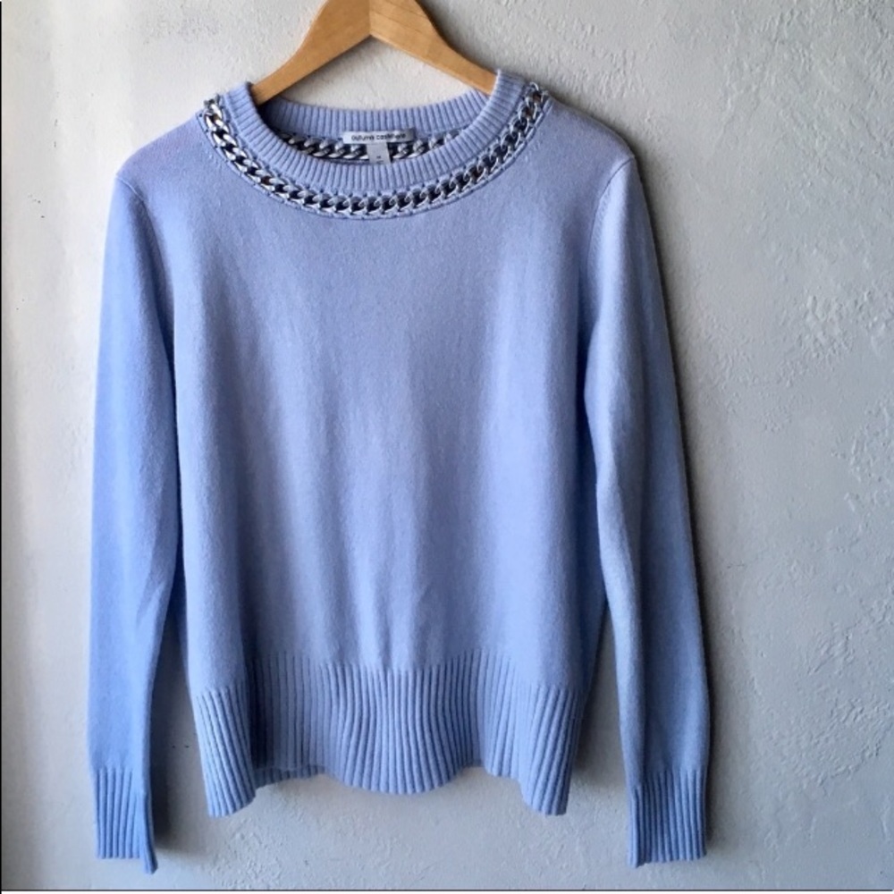 Light blue cashmere holiday sweater w/silver trim